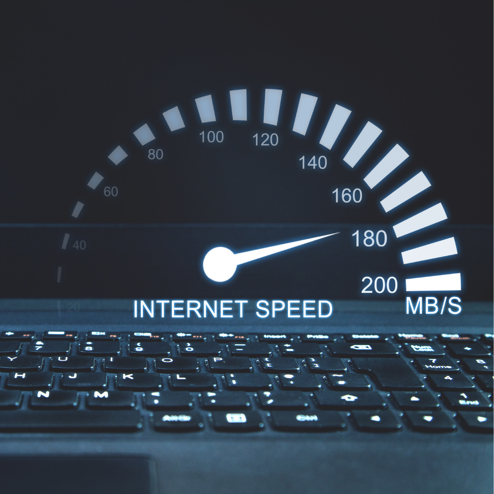 Laptop keyboard with glowing internet speed gauge showing 180 Mbps, representing high-speed internet from MetaLINK Technologies.