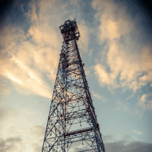 Fixed wireless internet tower at sunset, representing MetaLINK Technologies' rural broadband coverage and connectivity