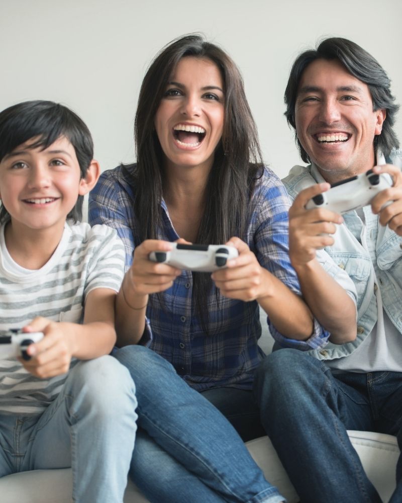 Family enjoying video games together with fast and reliable MetaLINK internet