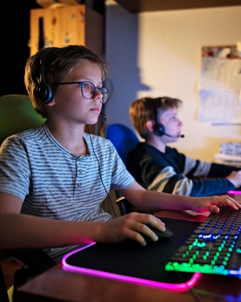 Two boys gaming online using MetaLINK high-speed internet