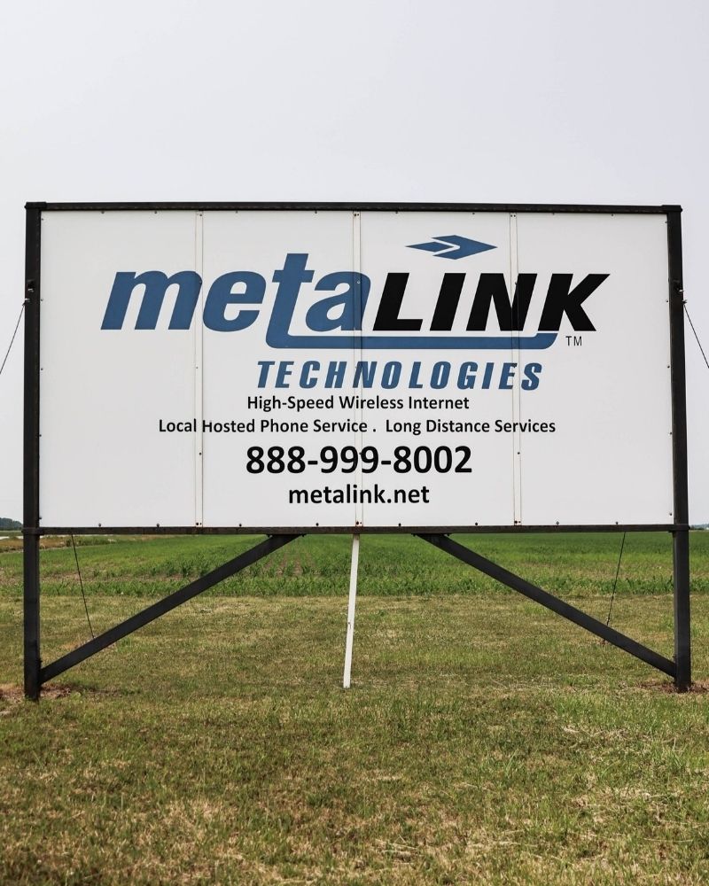 MetaLINK Technologies roadside sign promoting wireless internet and phone services in rural Ohio