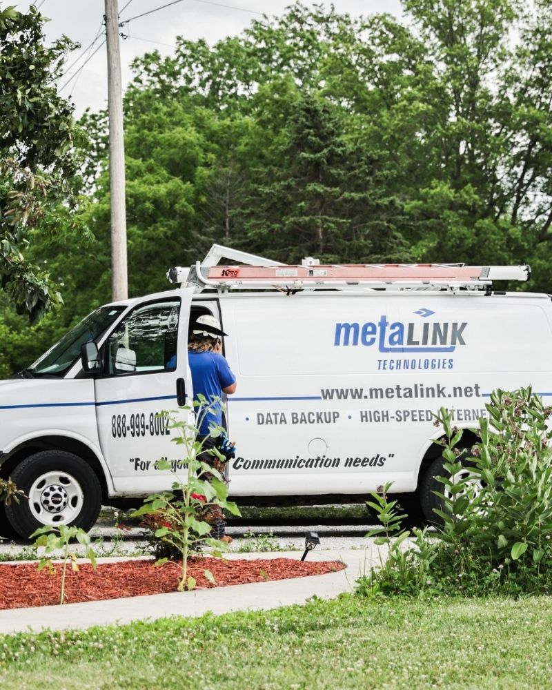 MetaLINK Technologies service van parked at a customer’s home during installation