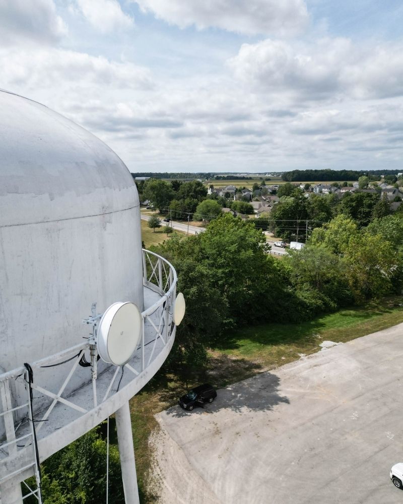 Wireless internet equipment installed on water tower overlooking Montpelier Ohio neighborhood