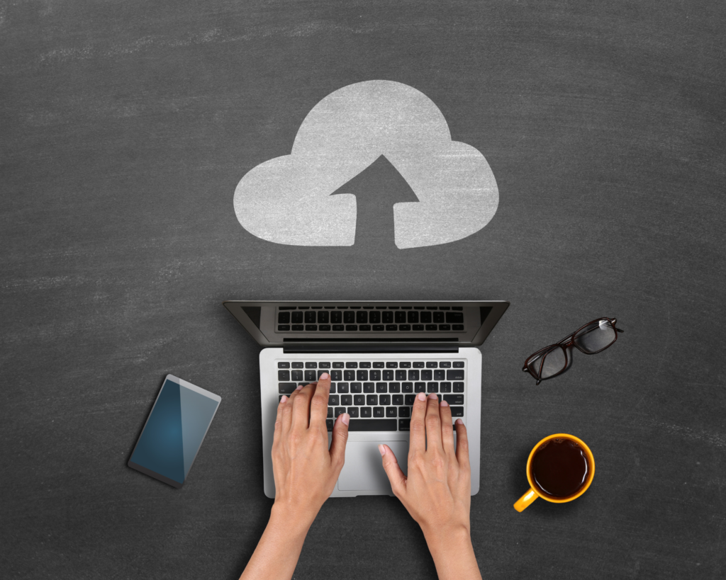 Person using a laptop to upload to the cloud with MetaLINK Technologies high-speed internet in Northwest Ohio