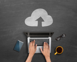 Person using a laptop to upload to the cloud with MetaLINK Technologies high-speed internet in Northwest Ohio