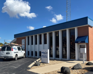 MetaLINK Technologies office building exterior with company signage and service vehicle, representing a locally owned internet and TV provider