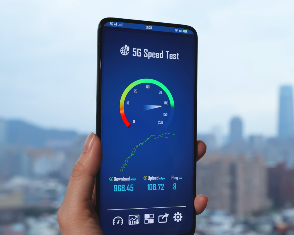 Smartphone displaying an internet speed test app with download, upload, and ping results, representing high-speed internet performance, broadband connectivity, and network speed testing.