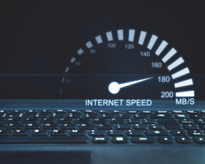 Laptop screen displaying an internet speed test gauge showing fast download speeds near 180 MB/S, representing reliable high-speed fiber internet performance.Laptop screen displaying an internet speed test gauge showing fast download speeds near 180 MB/S, representing reliable high-speed fiber internet performance.